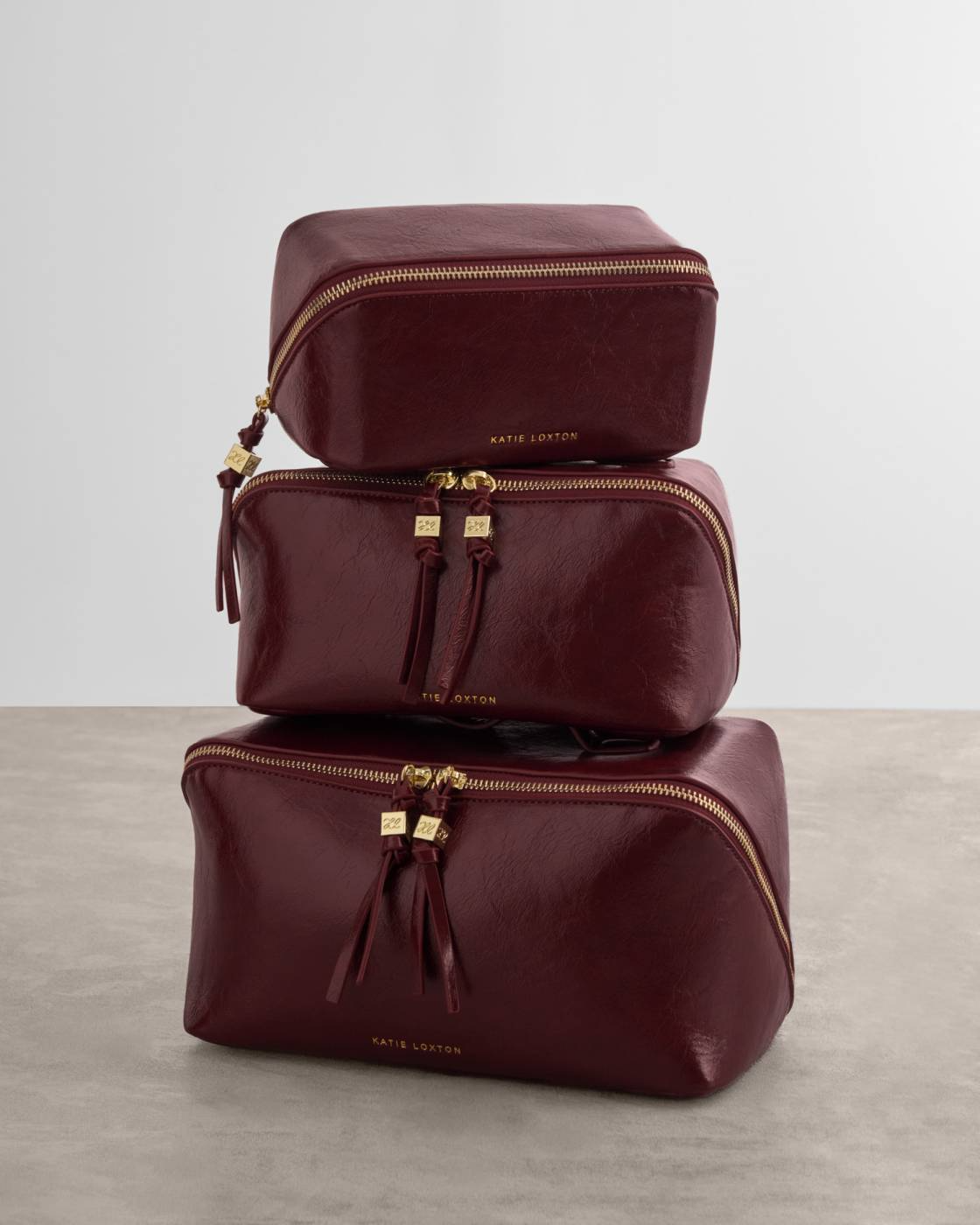 KATIE LOXTON SOHO LARGE MAKE UP/BAG CHERRY PATENT
